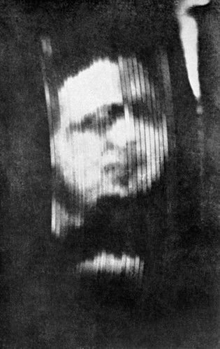 Figure 3 — One of the earliest recorded photographs of a television image, from the period of Baird's first demonstrations. The low resolution and portrait aspect ratio characteristic of early mechanical tele…